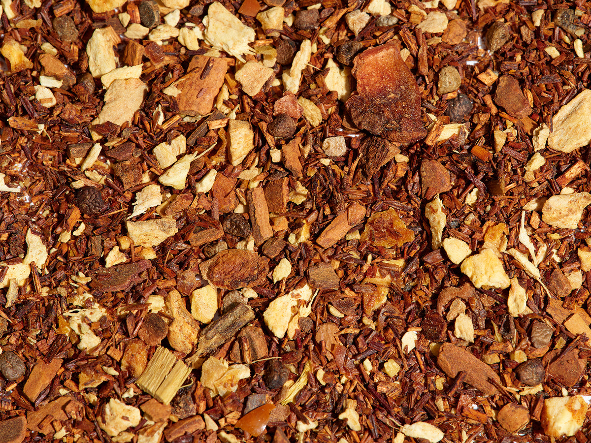 Brew tea loose leaf tea leaves on a flat surface.