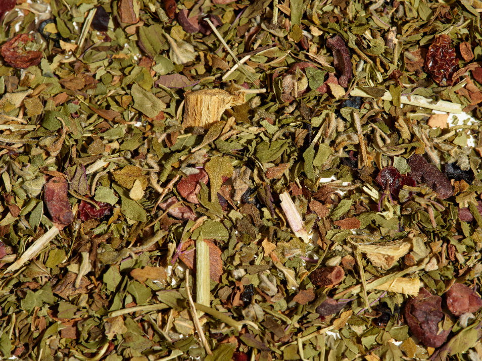 Bliss tea loose leaf tea leaves on a flat surface.
